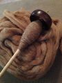 Yarn spun on a drop spindle